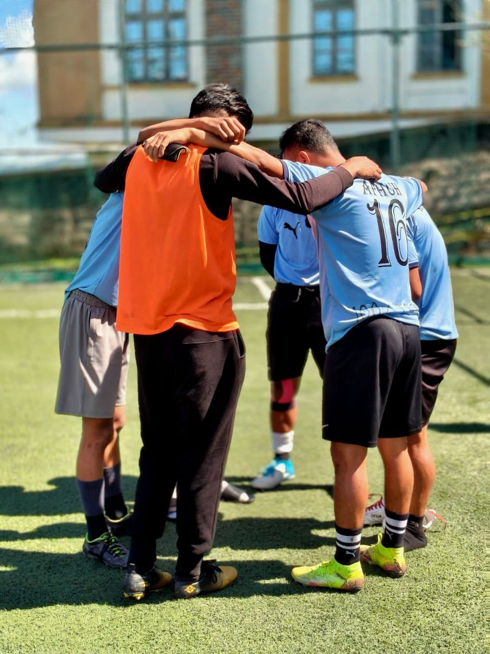 AEBS students playing sports on campus